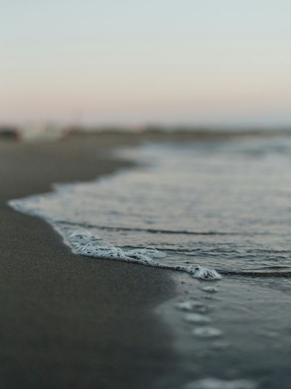 Audio meditation titled 'The Quiet Shore' by Retrained Minds Hypnotherapy - a calming guided session for anxiety relief and emotional balance.