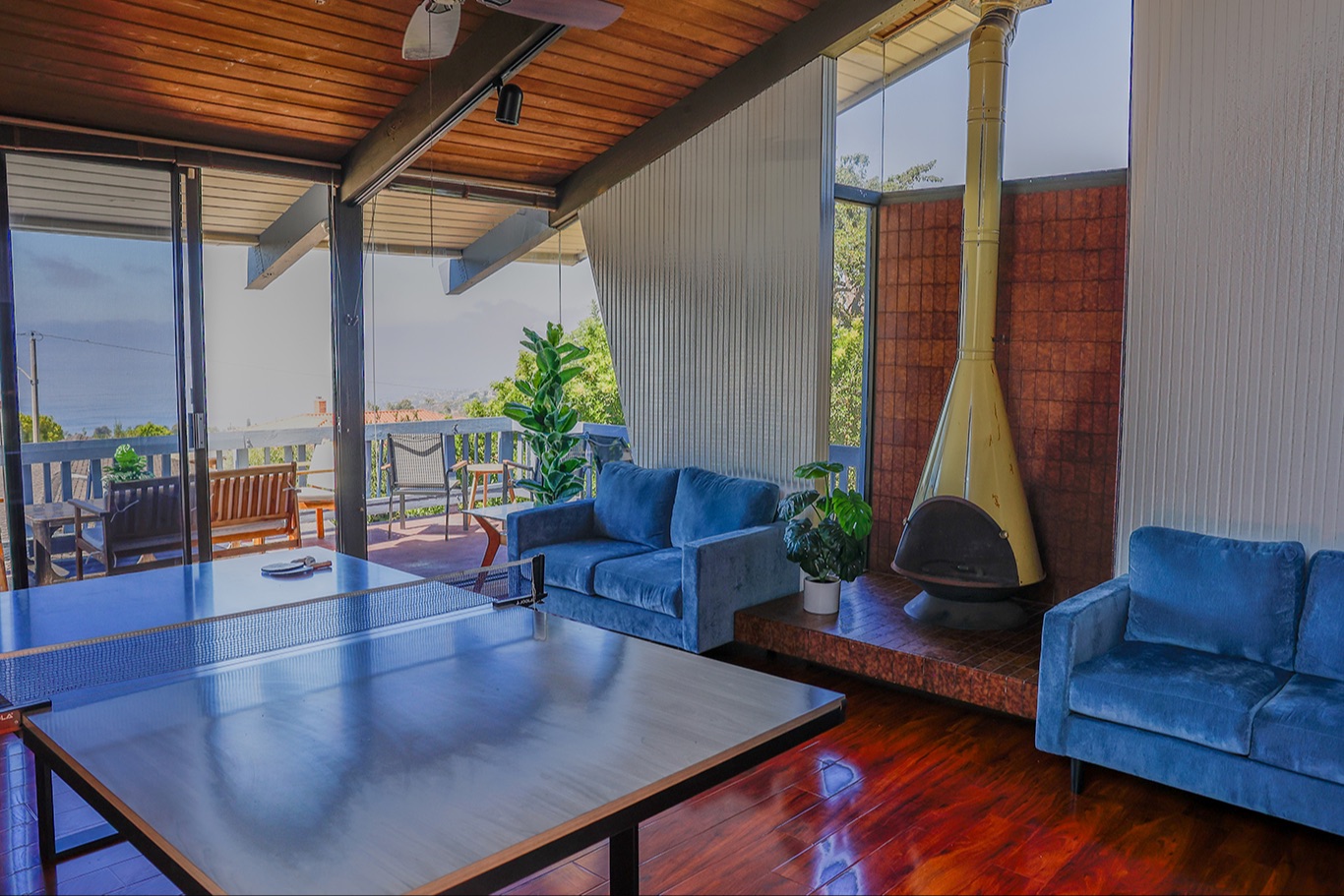 beautiful living room with cherry wood floors and ocean view at our supportive housing