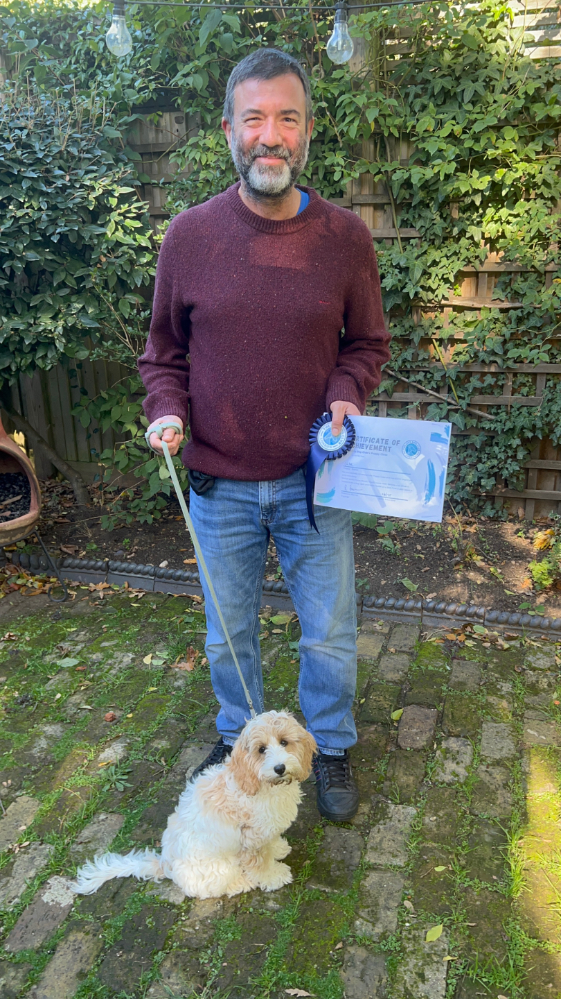 Puppy and owner at puppy class graduation