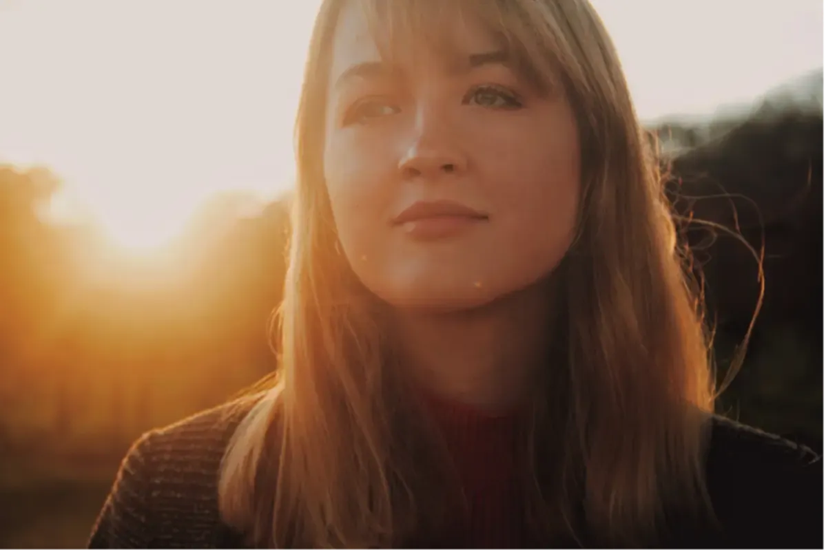 Woman near sunset