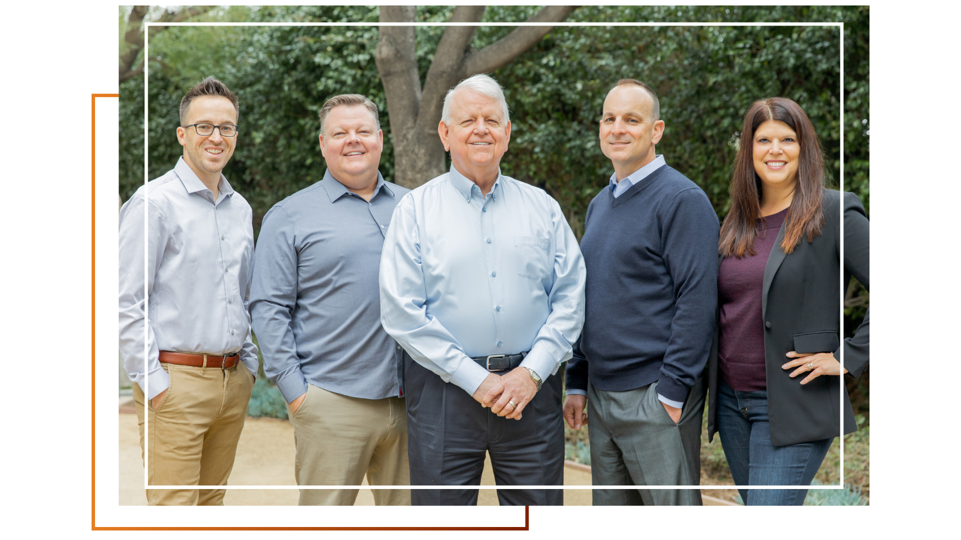 Smiling woman writing in a notebook on a cozy couch, representing the creative and guided writing journey through Author Coaching