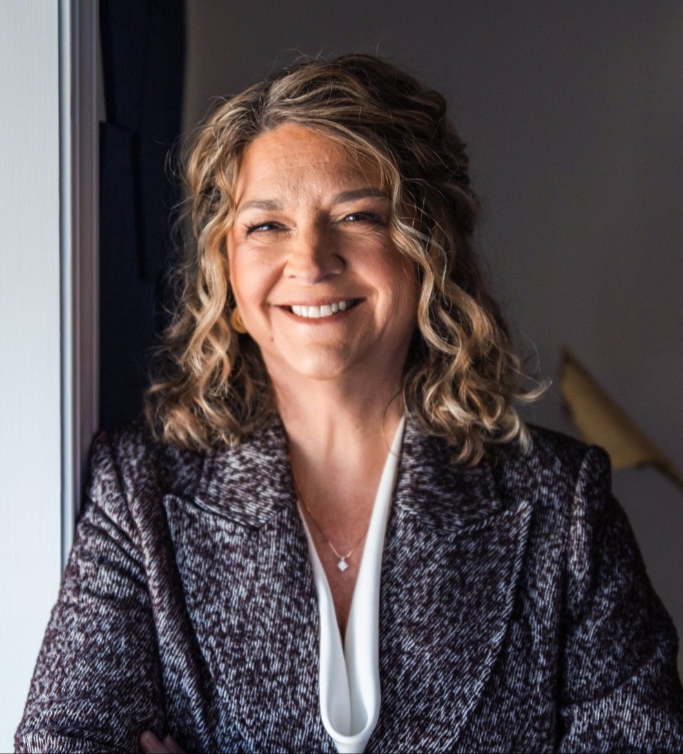 Walker Bird and Theresa Hubbard smiling outdoors