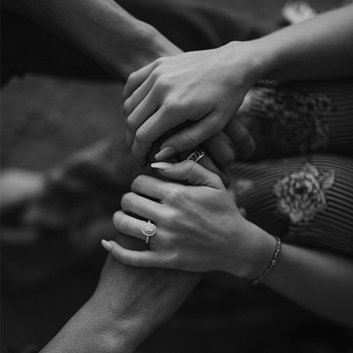 hands holding after reconnecting a relationship in somatic therapy