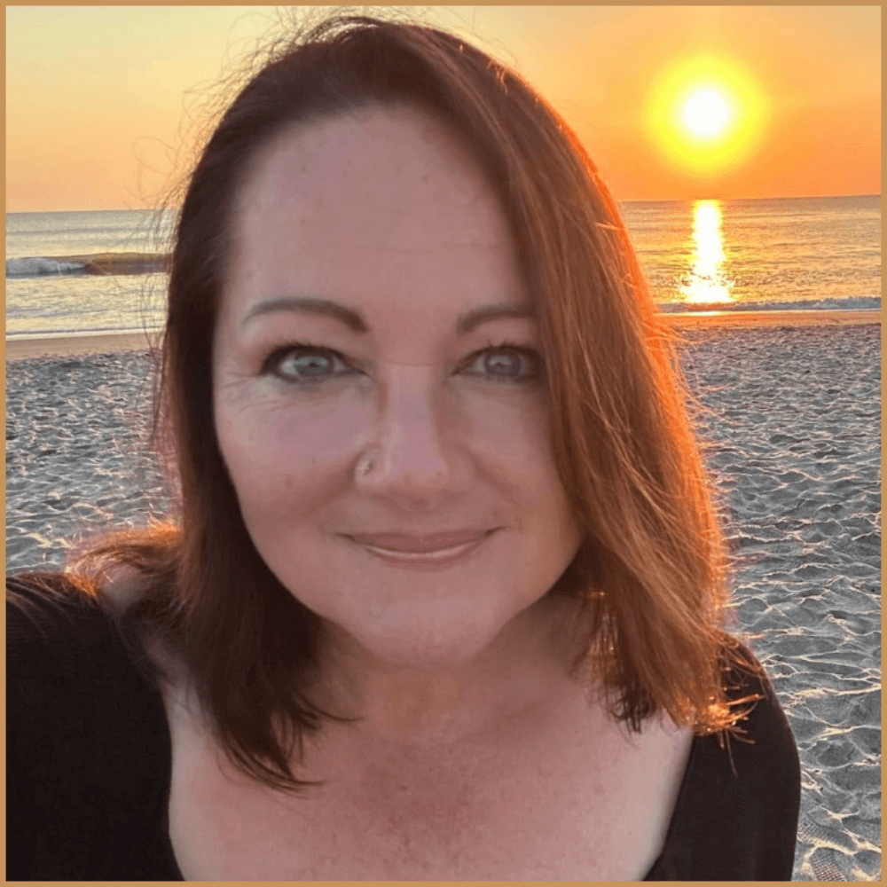 Jackie Flynn, LMHC-S, RPT-S – Expert trainer in EMDR and Play Therapy for Children, smiling in front of a neutral background.