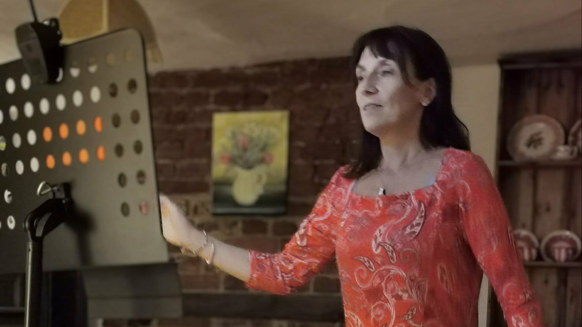 Winter garden seen through a window, suggesting pause and reflection.