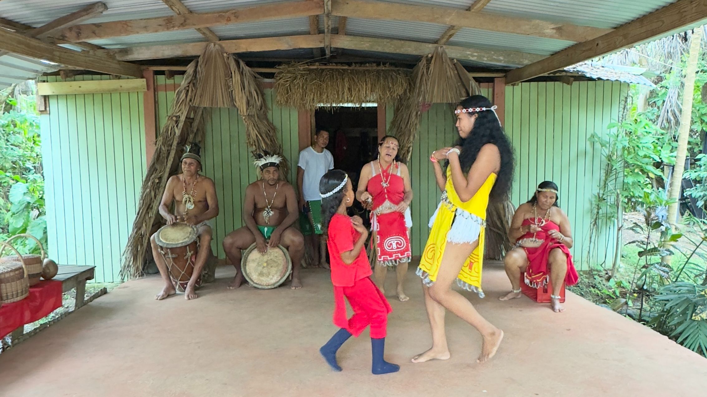 Cultural dance and drumming performance by locals in Dominica, Roseau.