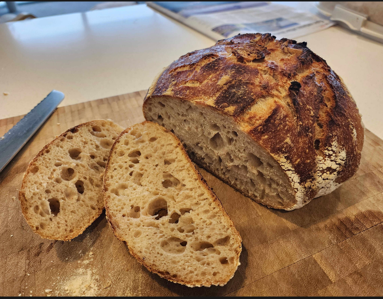 A beautiful sliced sourdough loaf made by a student of my course