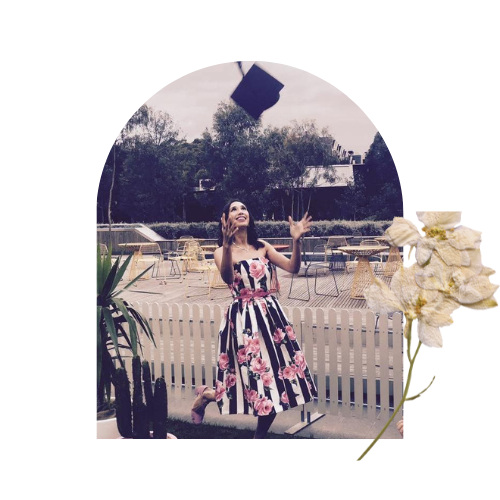 imae of woman throwing up a graduation cap