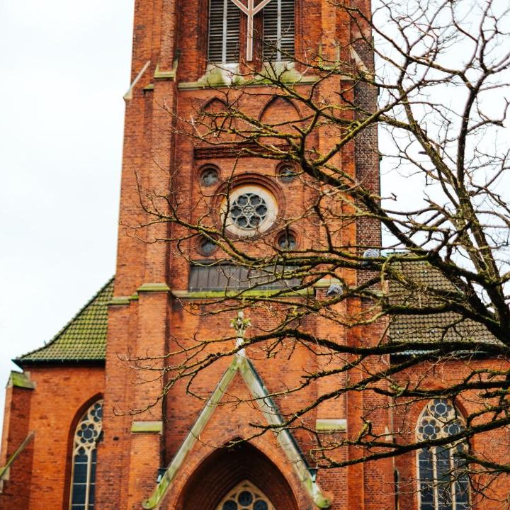 red brick church with bell tower
