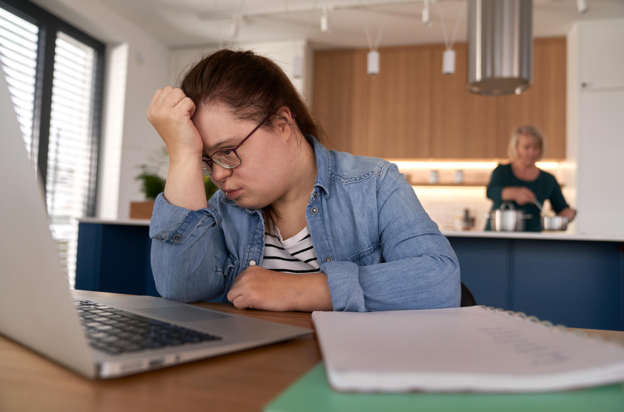 Young Women with Down Syndrome Looking at a computer 
