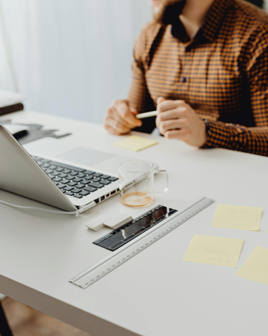 Man on group call with laptop