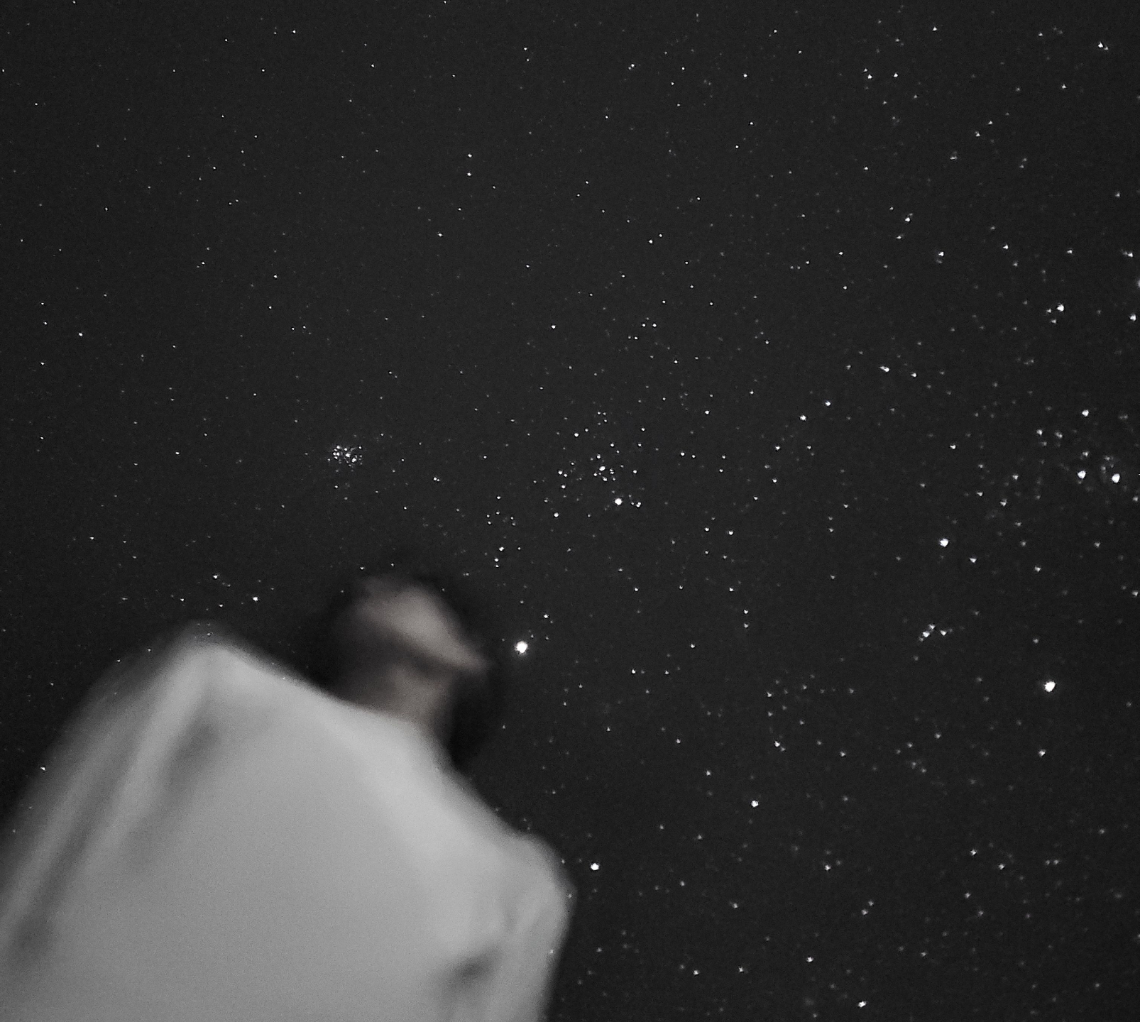 founder standing with star background