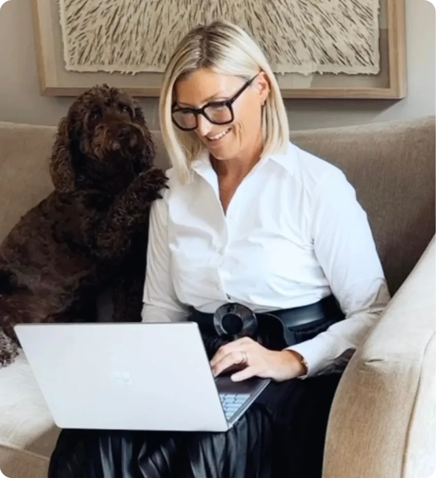 Pippa Savory holding a phone to mirror