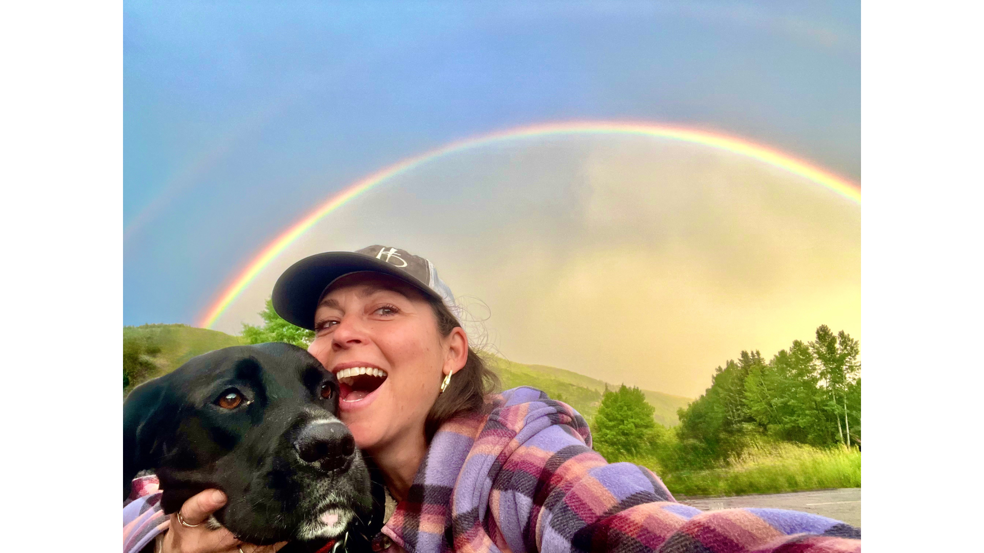 Sara and Ernesto under a rainbow