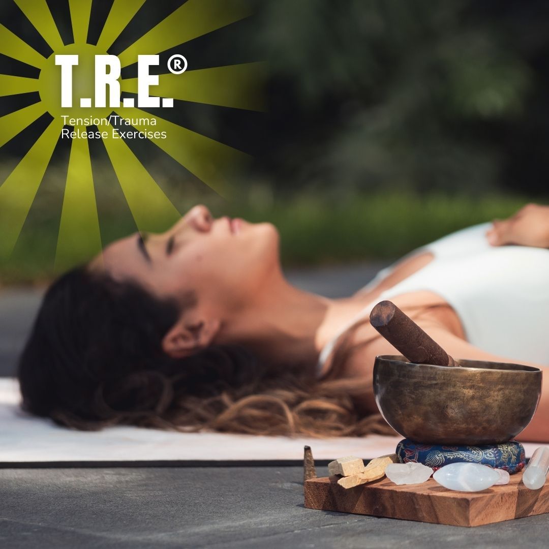 woman on yoga mat with singing bowl with crystals