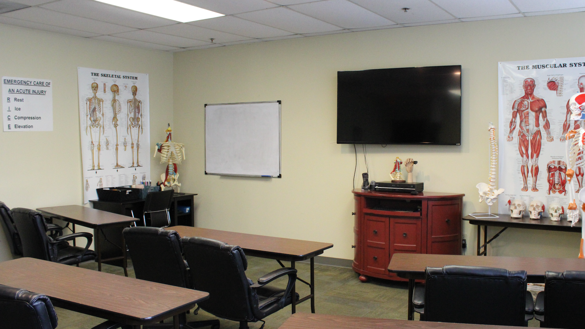 Massage therapy school treatment rooms and training tables