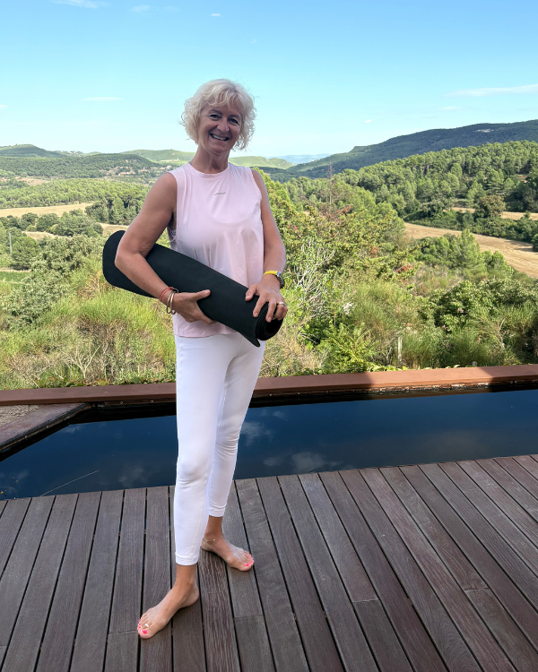 A montage of Julie Ann Garrido teaching & practicing yoga, and chatting to guests at Yourself Yoga menopause wellness retreat