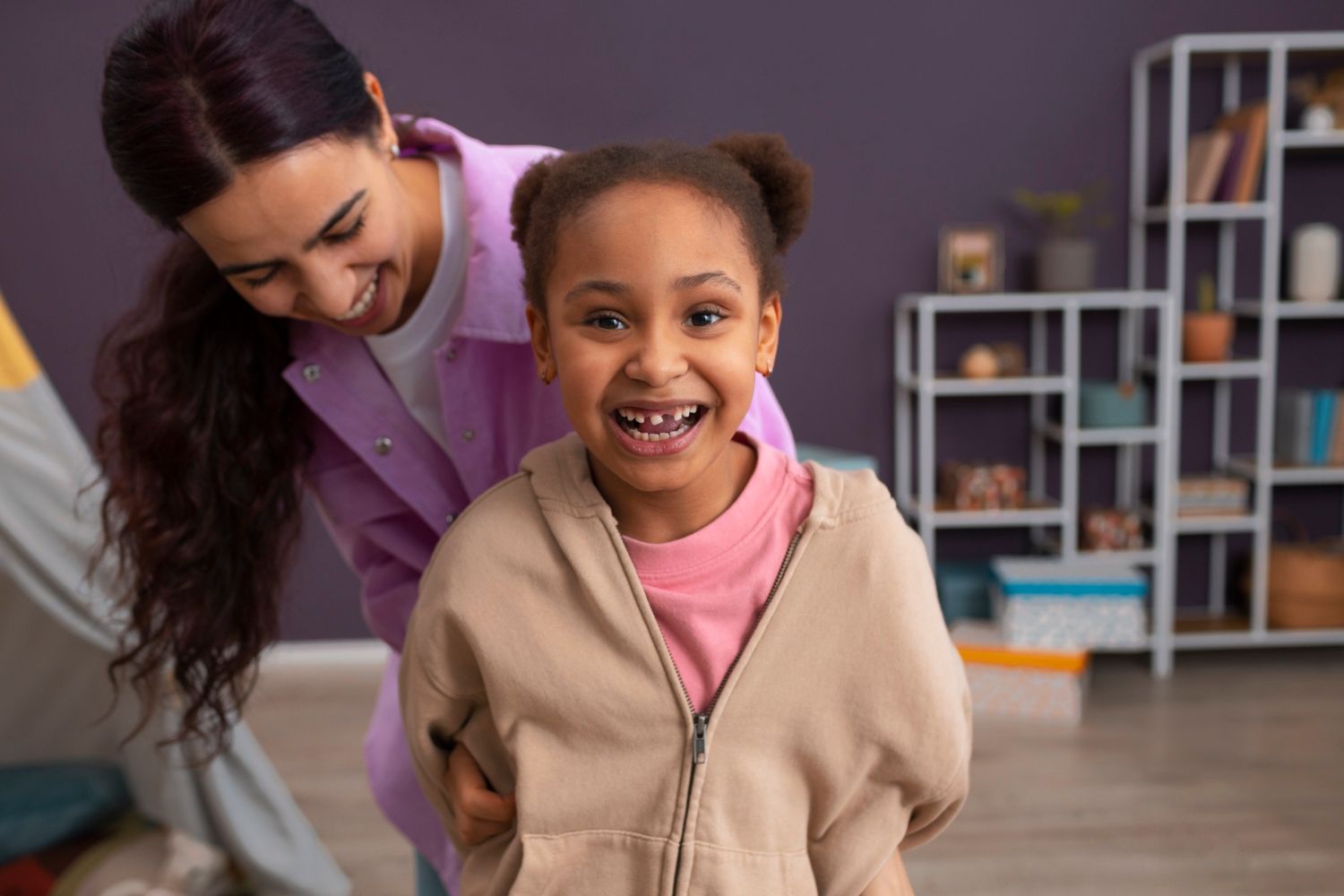 Occupational therapy session supporting a child and caregiver with sensory and regulation needs