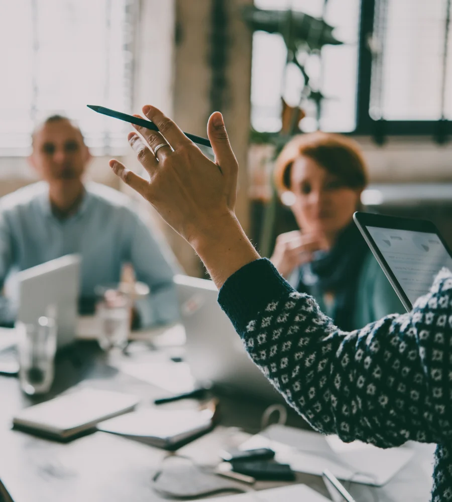 work presentation with a corporate leader speaking to his team