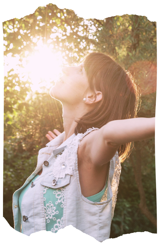 Open journal and cup of tea on a wooden table, symbolizing integrating shamanic rituals and sacred rhythm into daily life.