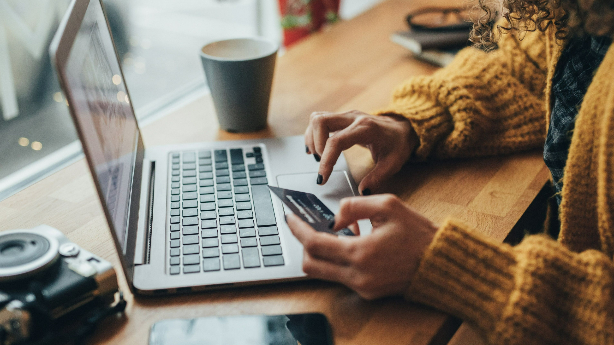 “Laptop and coffee on a desk symbolizing reflection and devotional time.”