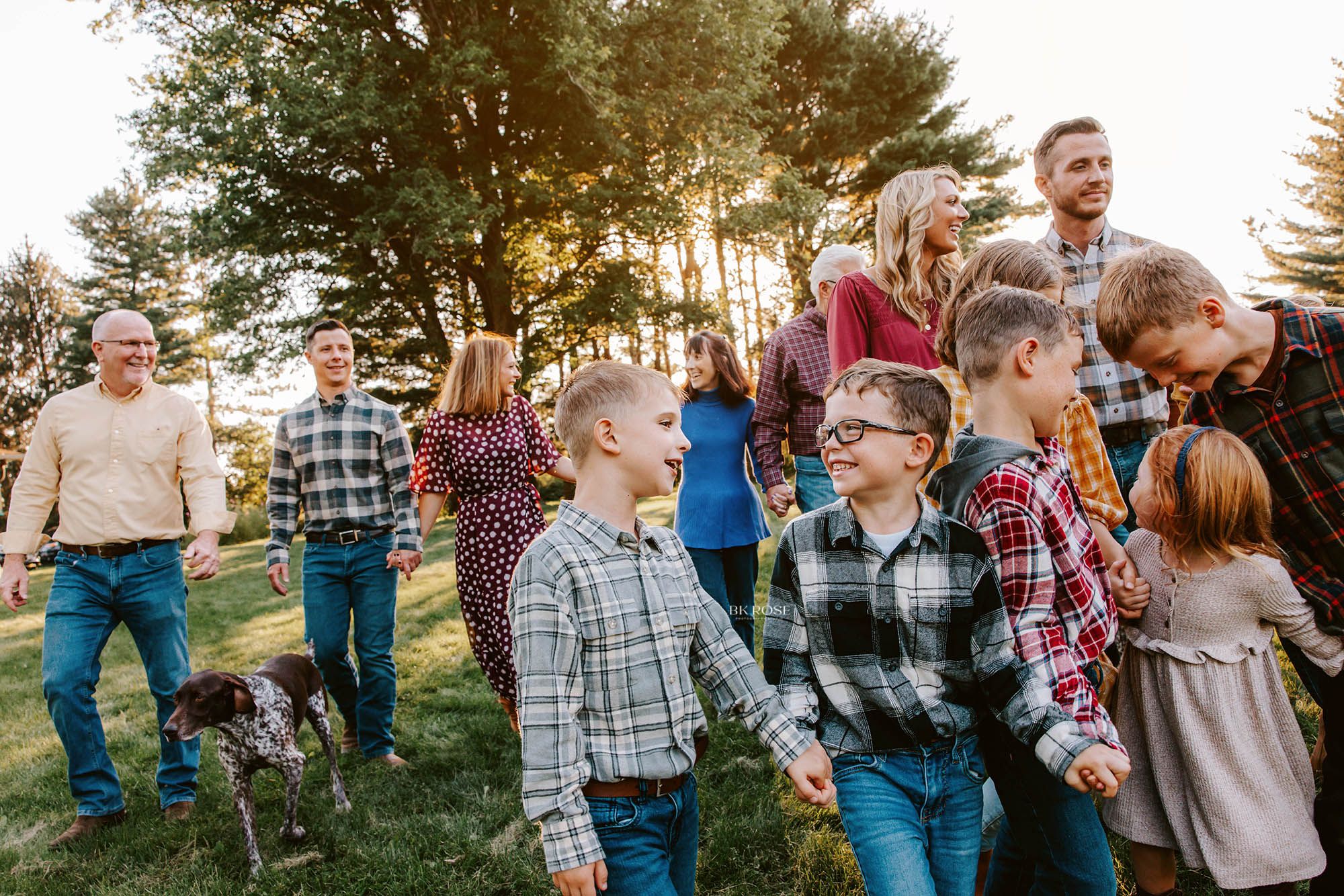 large group of people walking towards camera laughing