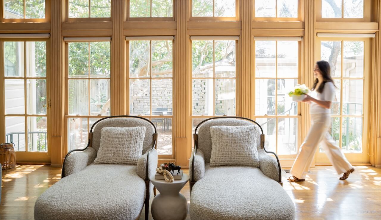 staged room with a certified home stager carrying decor