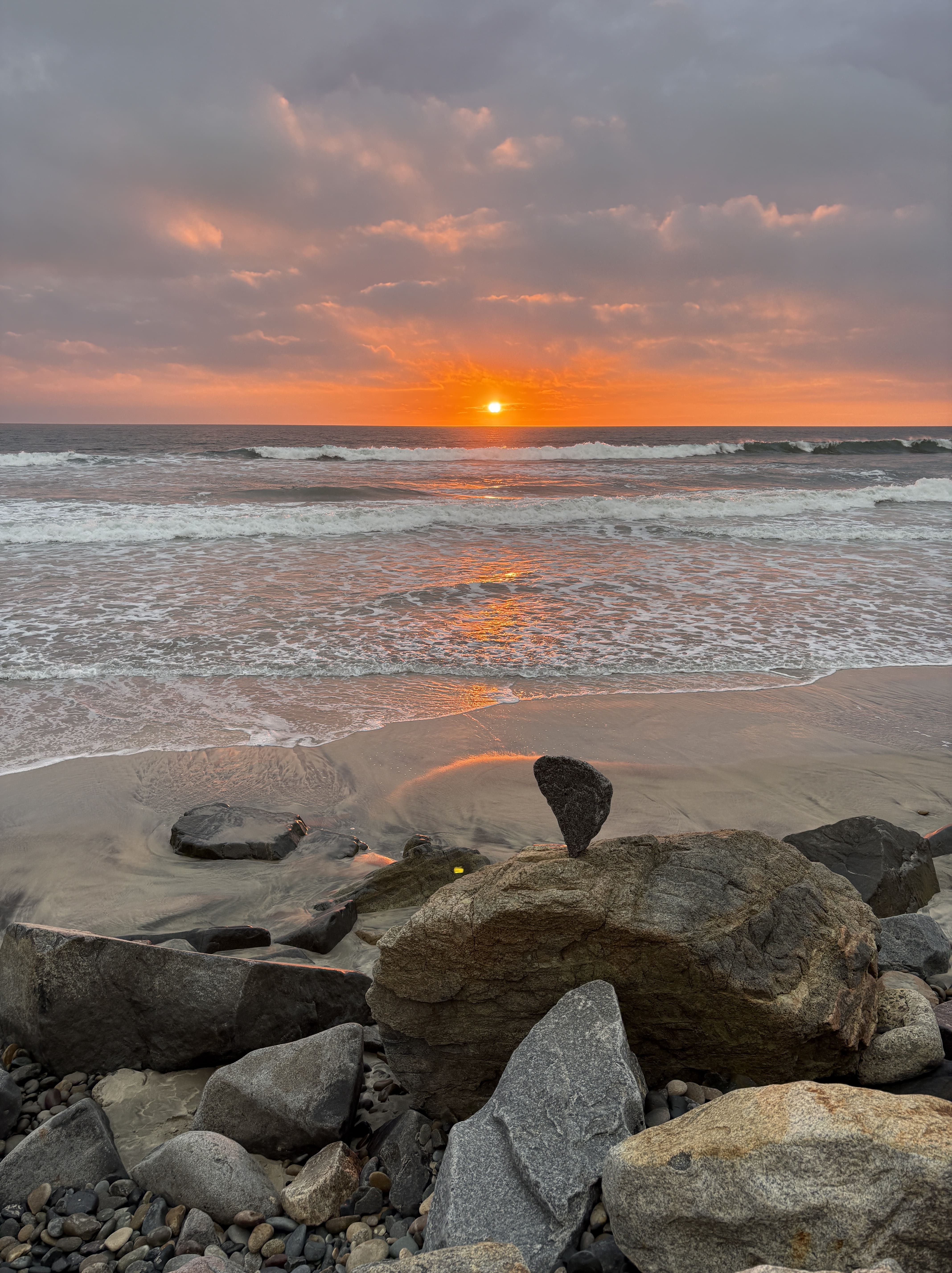 november sunset with a balanced rock