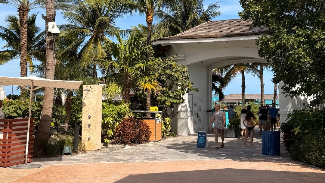 Baha Bay at Baha Mar: Shaded path lined with palm trees and tropical plants leading toward the beach