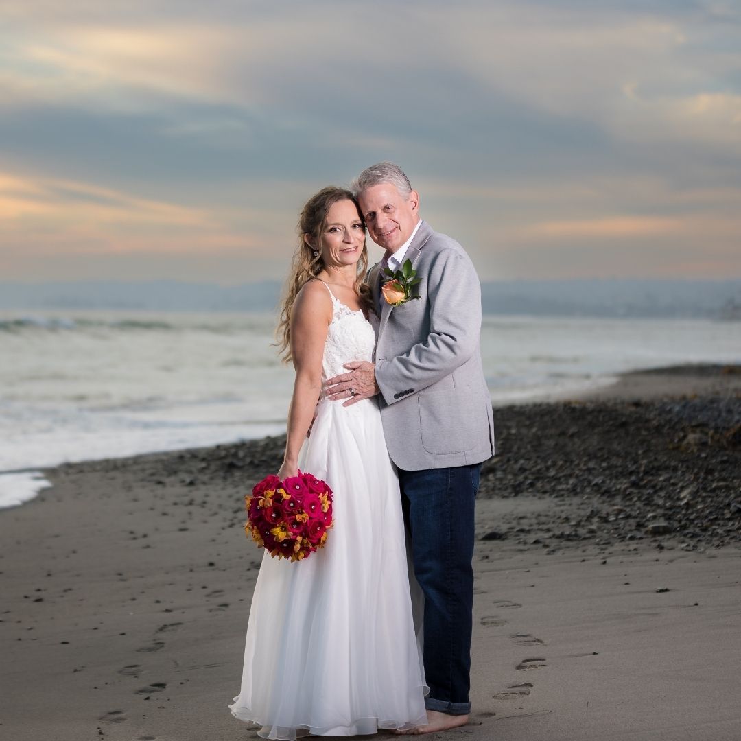 woman's hands at laptop with financial reports