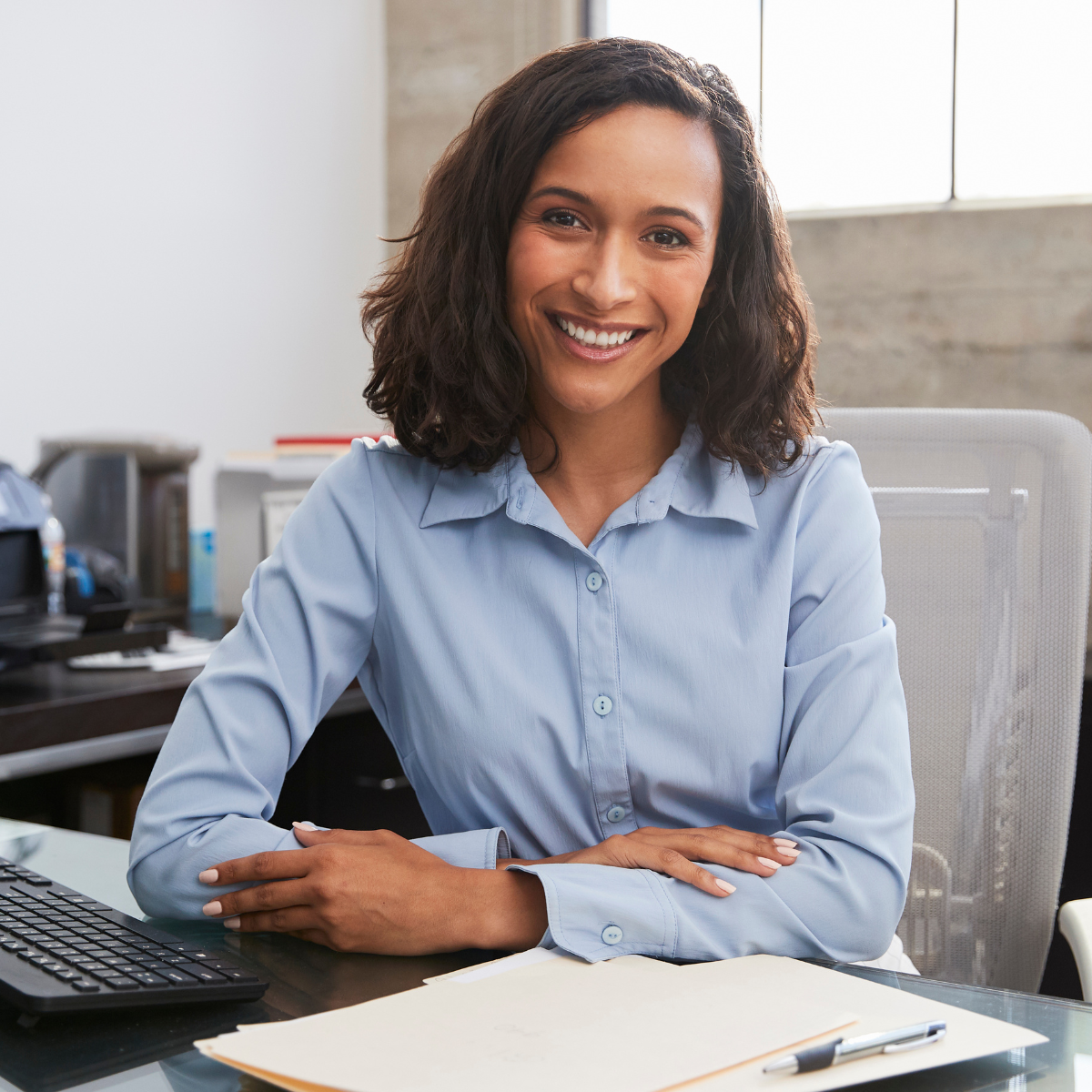 Professional working on sustainability reporting on a laptop