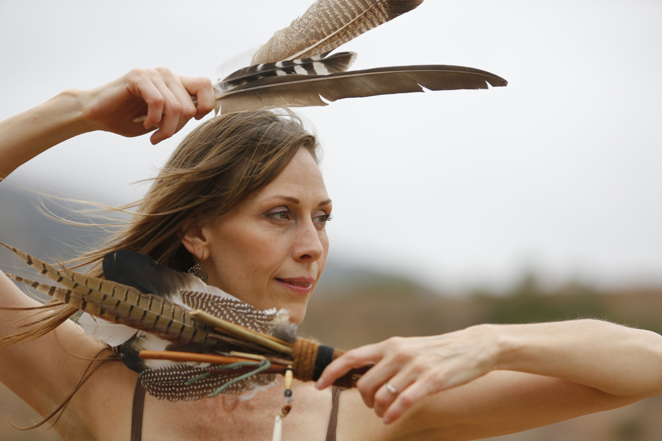 Nikki with feathers