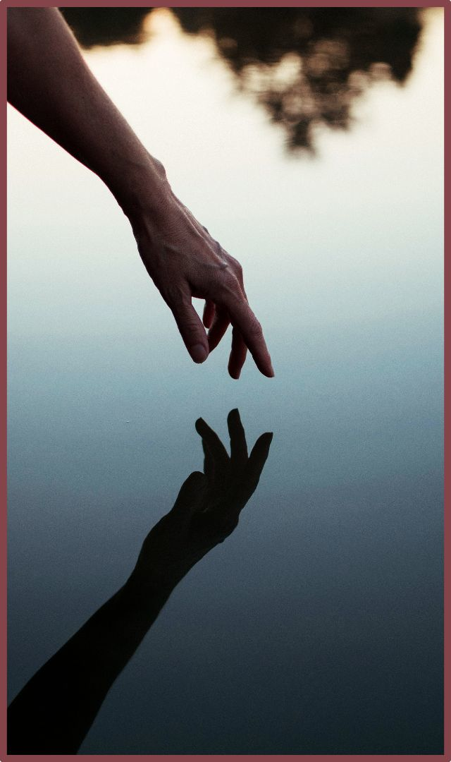 reflection in water symbolizing self-recognition