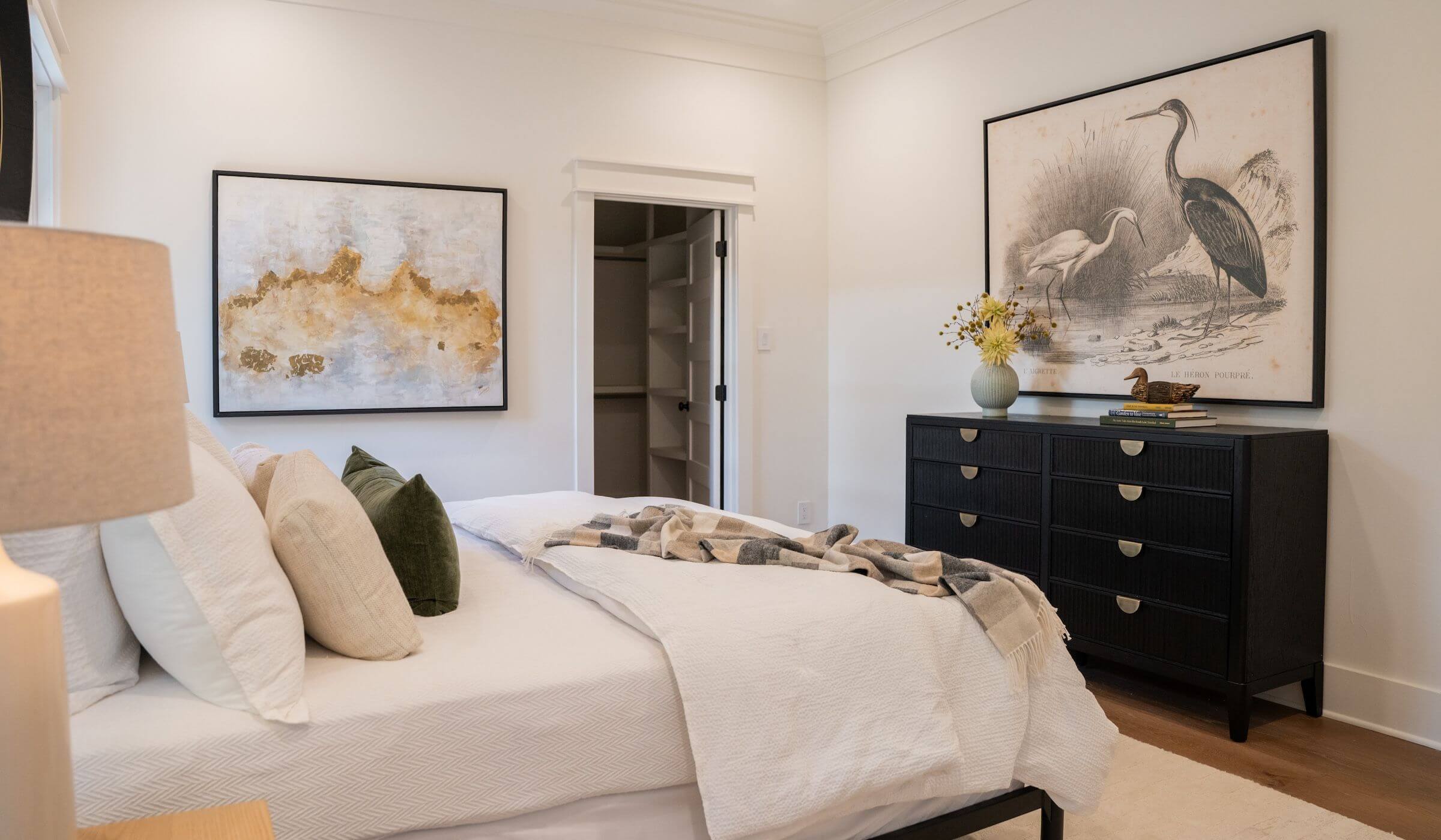 bedroom decorated with art, pillows, and accessories for sale in san antonio texas