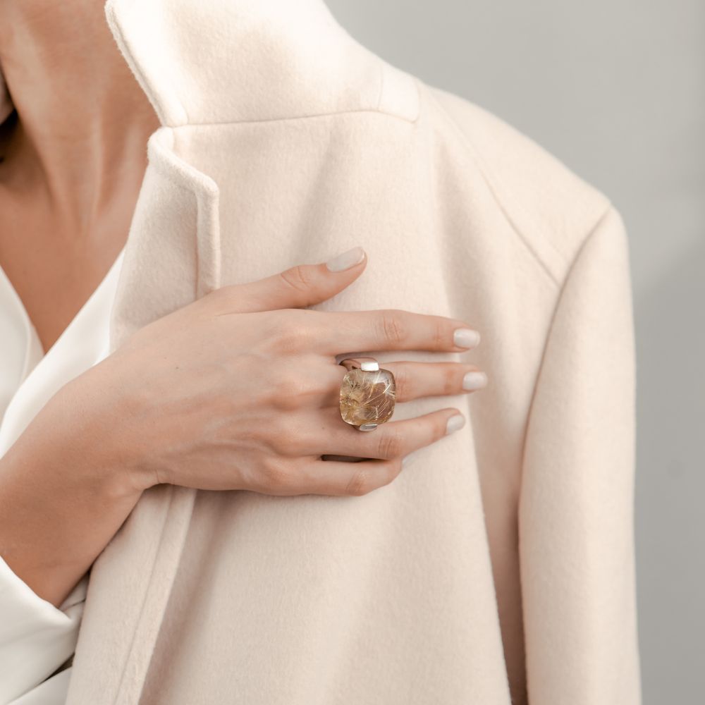 Minimal neutral woman's hand on chest