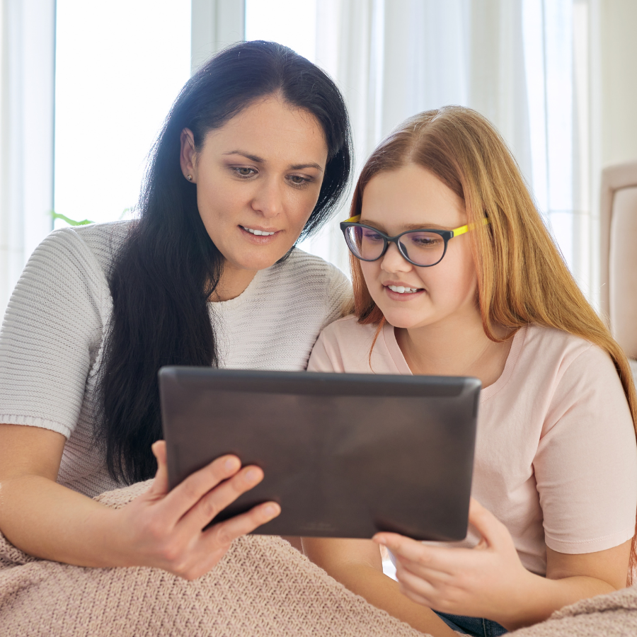 mom and teen son working together