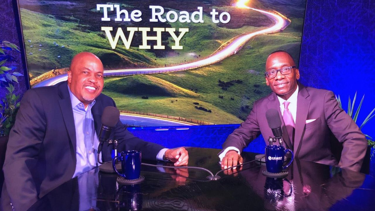 Dr. Michael Thompson speaking or preparing in front of the Road to WHY broadcast setup.