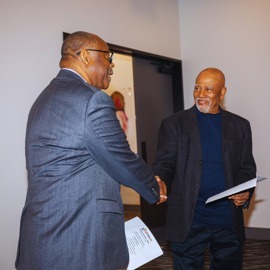 Dr. Michael Thompson speaking or preparing in front of the Road to WHY broadcast setup.