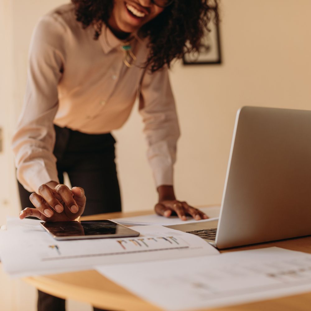 Smiling woman at desk