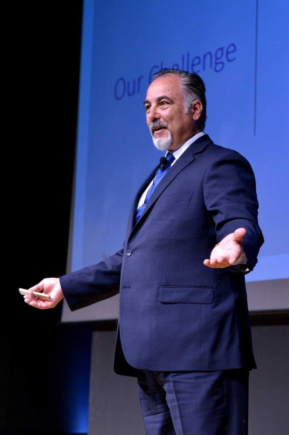 Kon Apostolopoulos Speaking on Stage