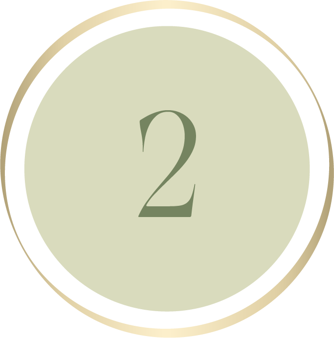 numero 2 vihreän pyöreän ikonin sisällä kultaisella reunustuksella