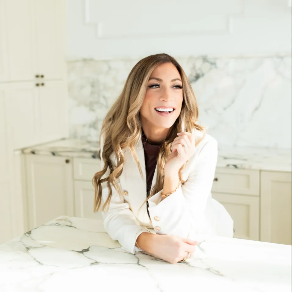person sitting on couch working on laptop