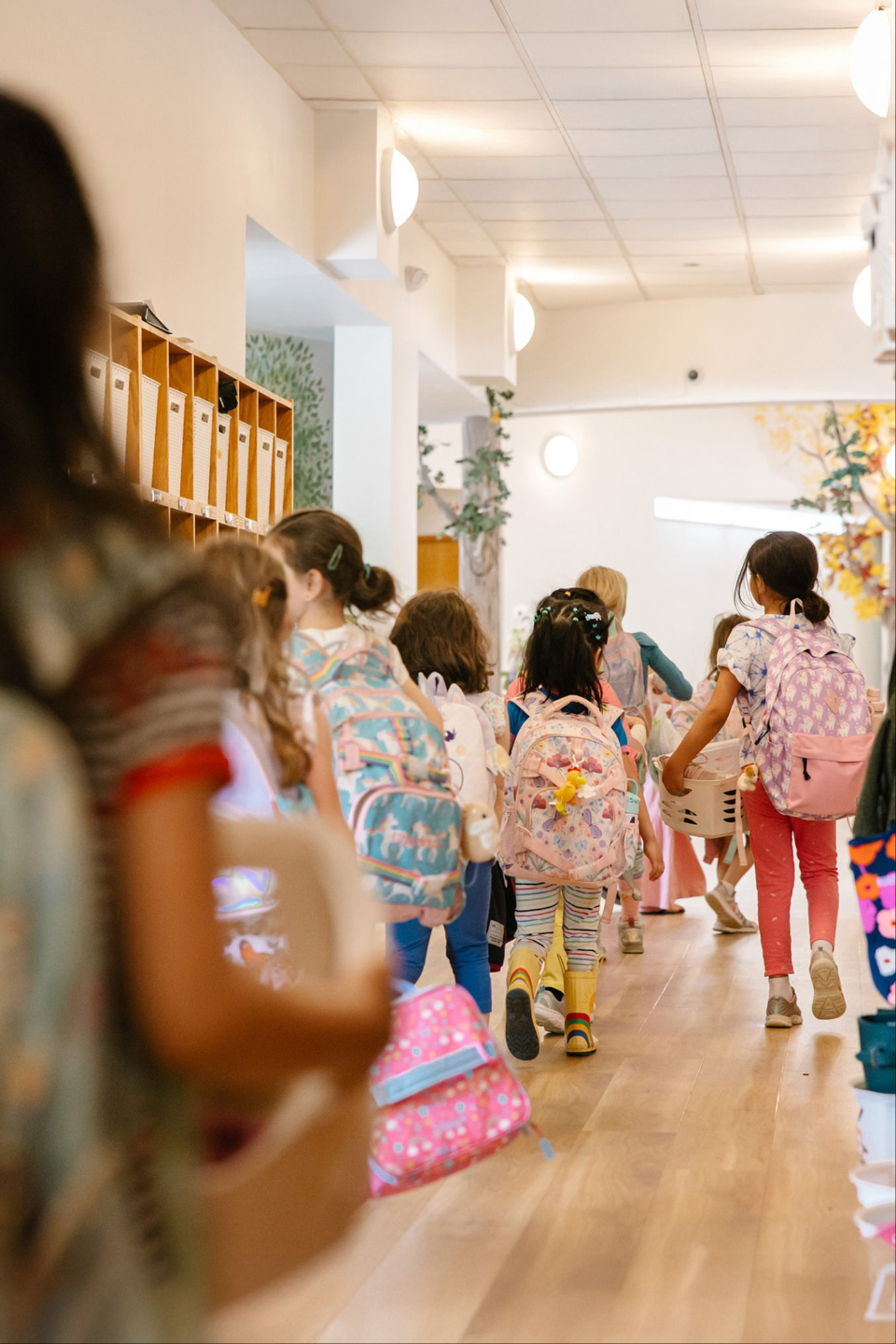 kids walking through a school hallway