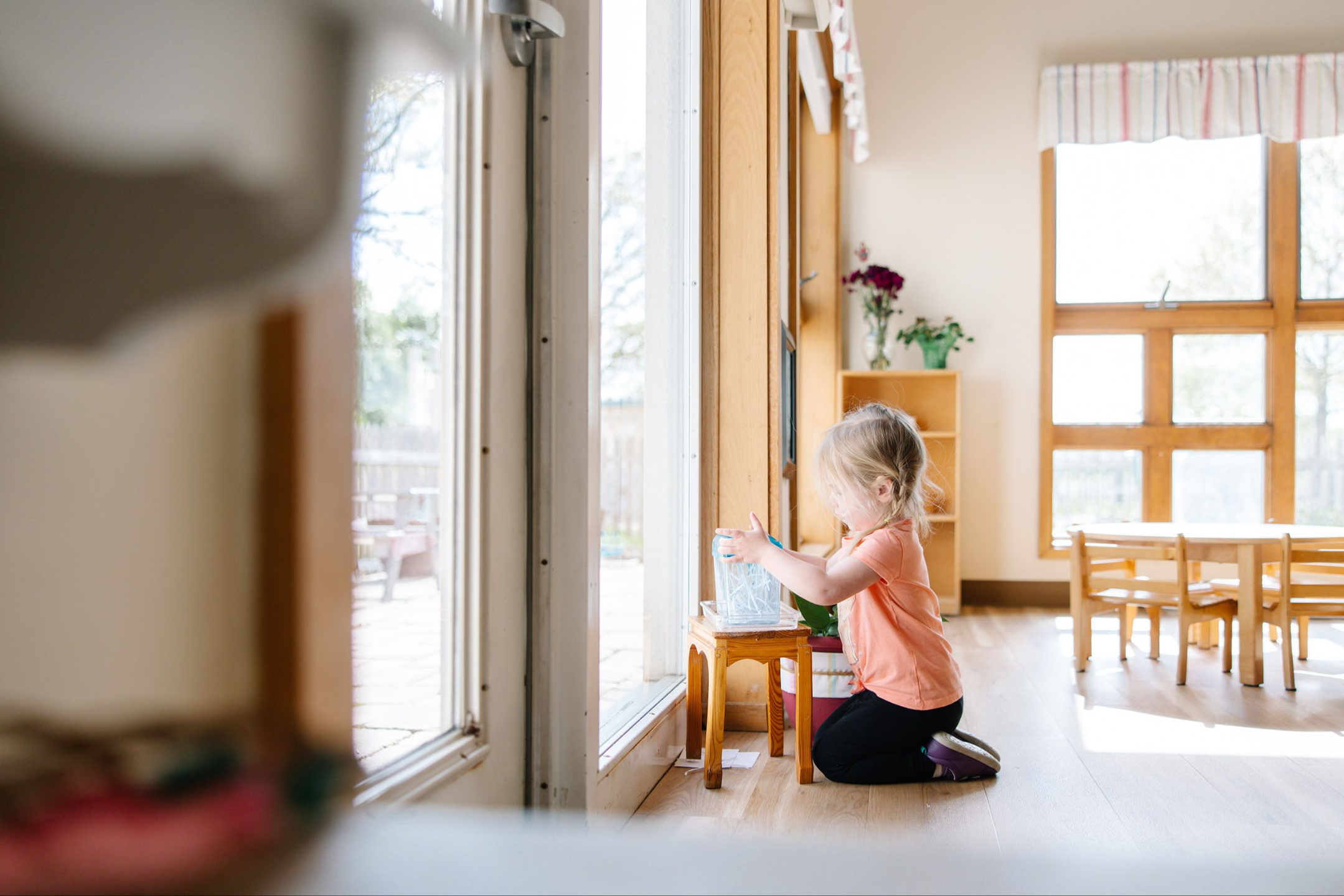 young girl working on a project in a school