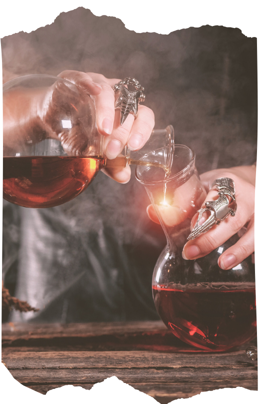 Hands pouring liquid between glass vessels in an alchemical experiment symbolizing embodied transformation