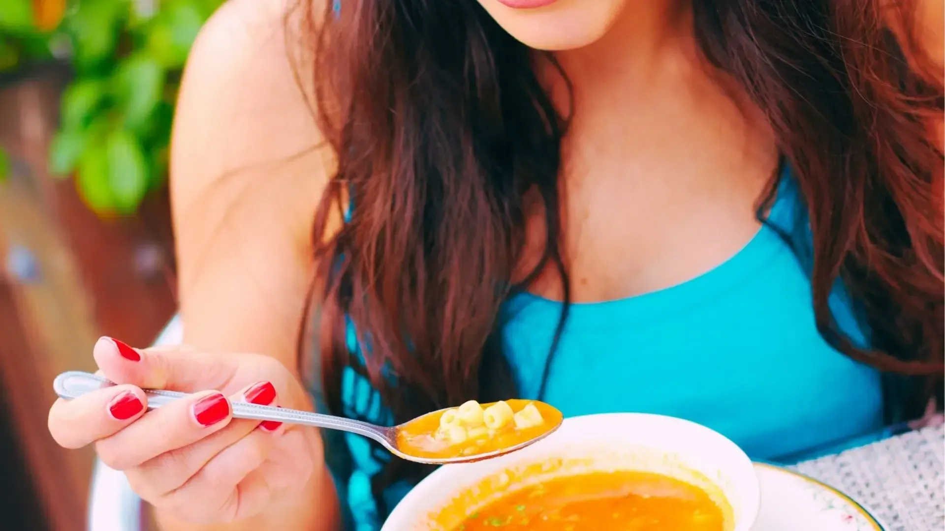 Girl eating soup