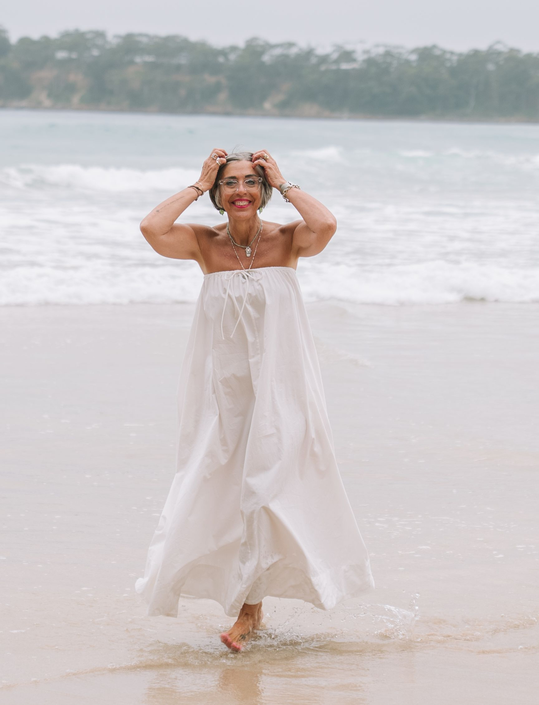 Catherine Bowyer, holistic coach and life strategist Canberra holding a cup with the words 'Darling, you are fabulous'. 