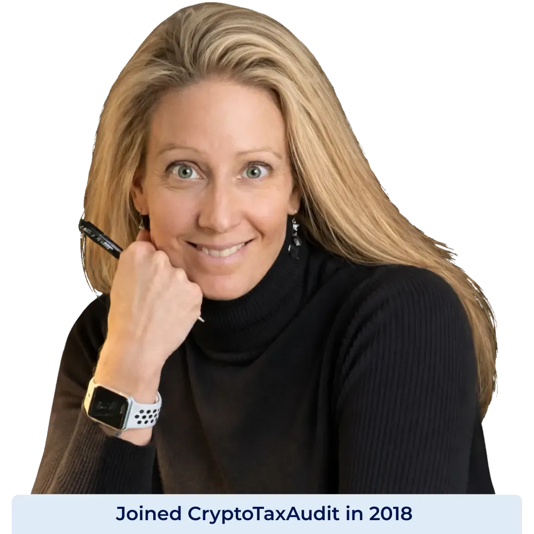 Portrait of Sarah, CPA and Director of Tax at CryptoTaxAudit, smiling, wearing a black turtleneck against a light blue background. Joined CryptoTaxAudit in 2018.