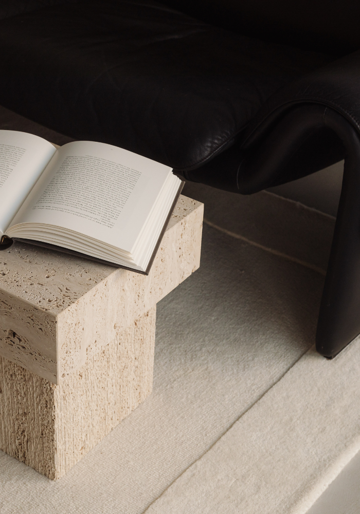 open book on end table, symbolizing entrepreneurial growth and knowledge..