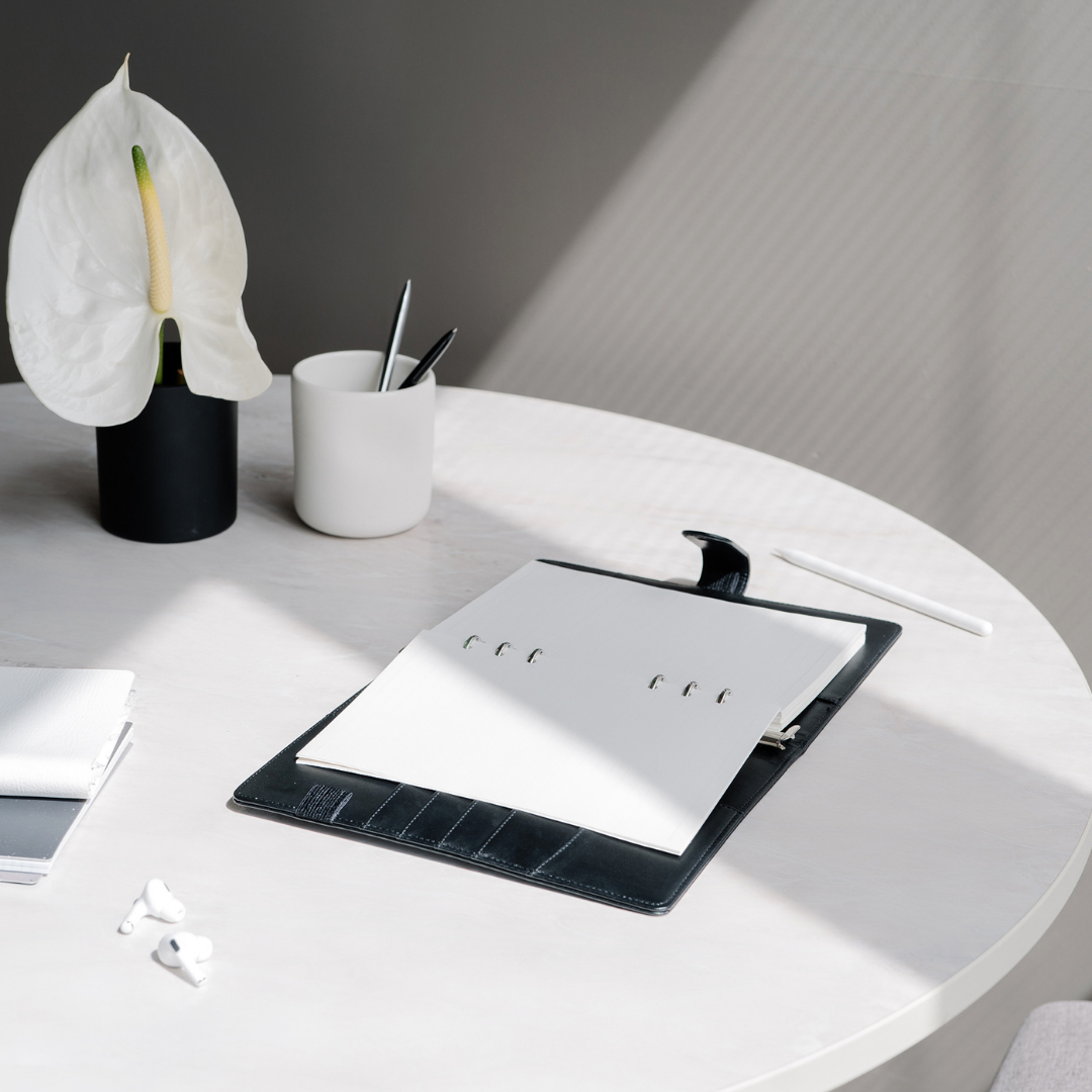 notebook and pen on table